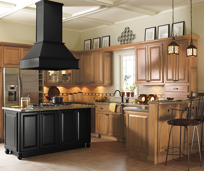 light_oak_cabinets_black_kitchen_island.jpg