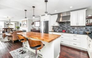 kitchen-with-white-cabinets-and-live-edge-wood-countertops