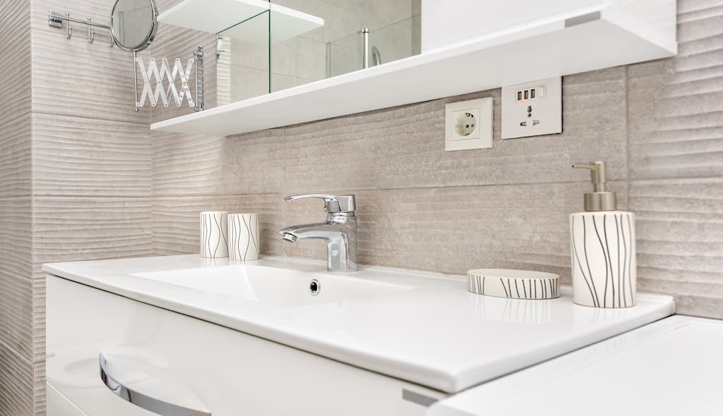 A modern sink and faucet. The combination of sink and faucet is crucial. 